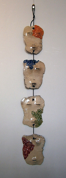 Colja de Roo + Set maskers aan koord, raku kleuren